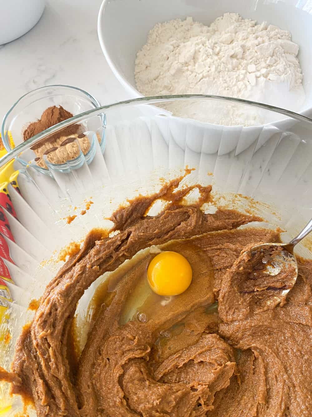 egg added to mixing bowl for gingerbread bars