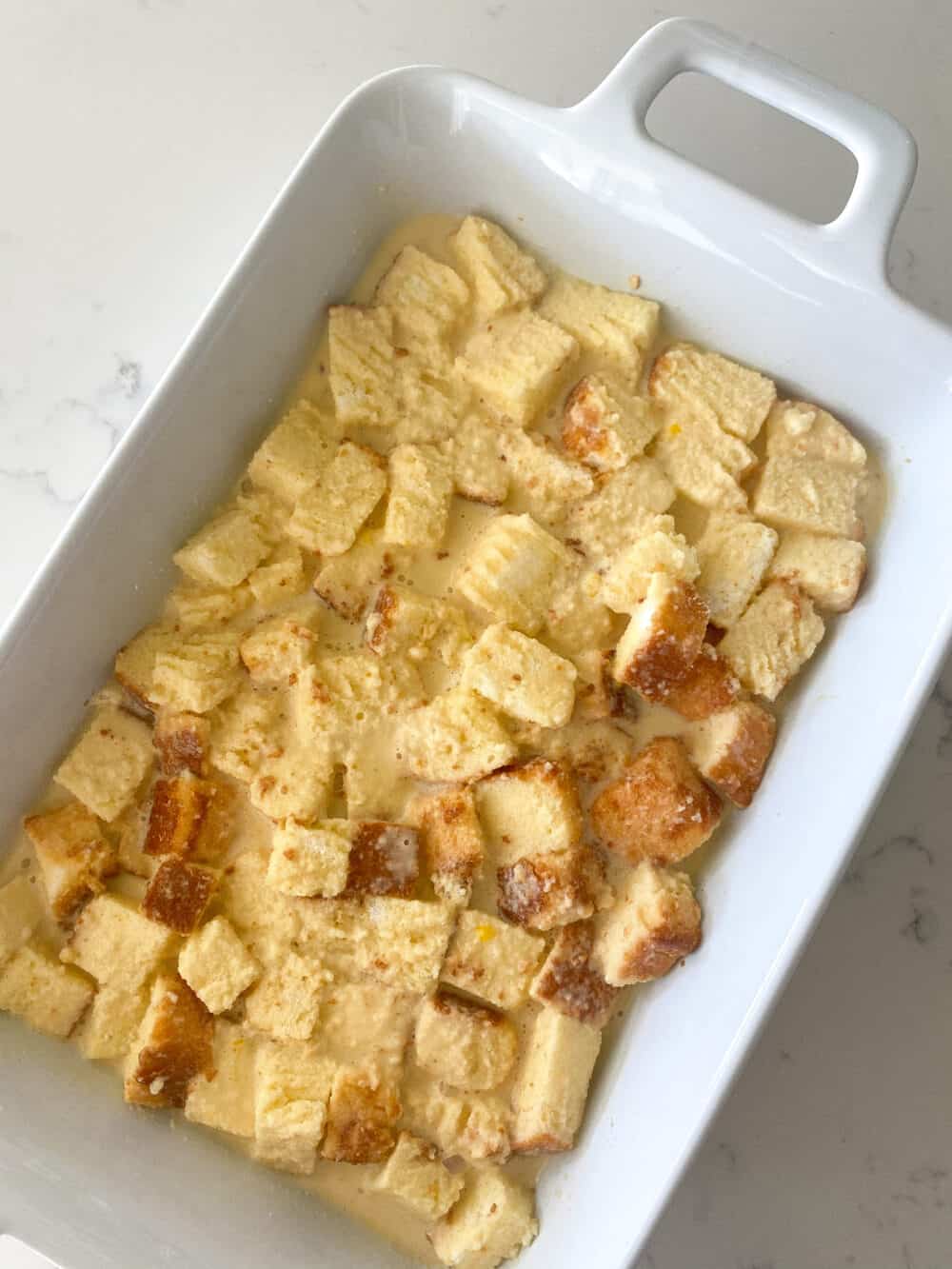 egg mixture in pound cake cubes in baking dish