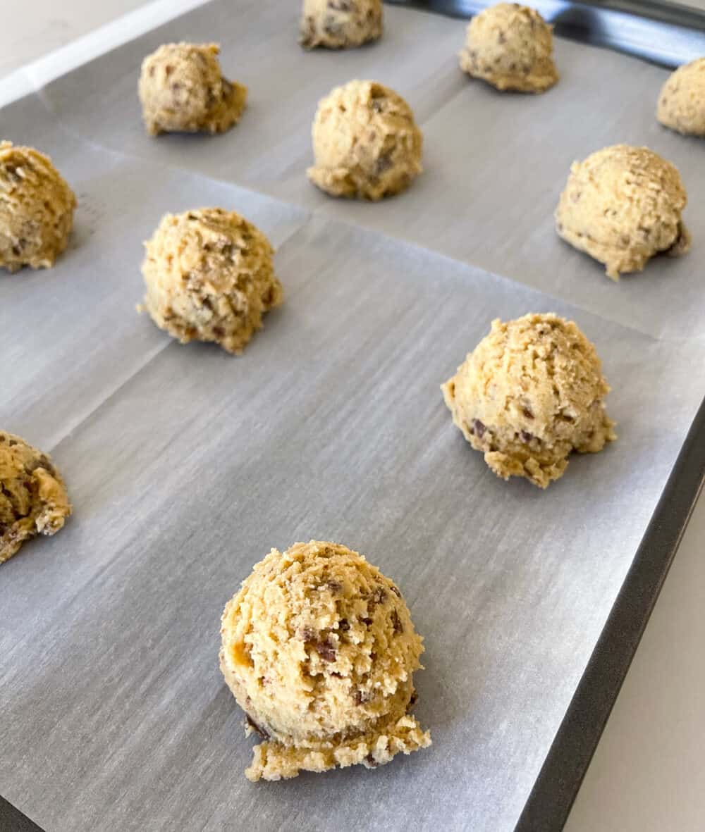 chewy chocolate chip cookies on baking sheet