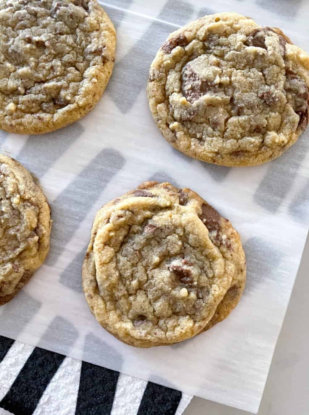 chewy chocolate chip cookies on napkin