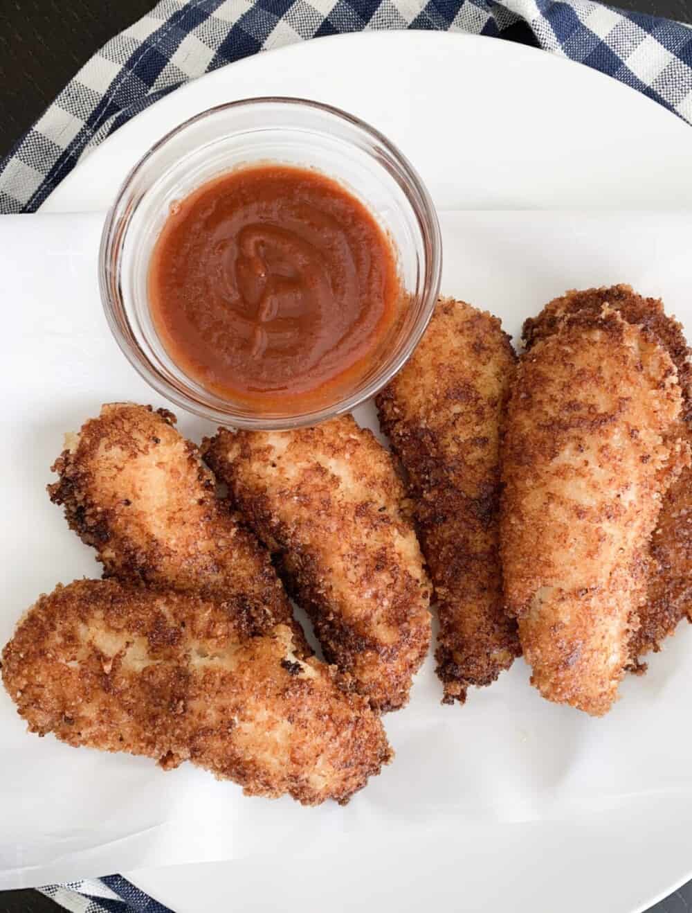 crispy chicken tenders on serving plate