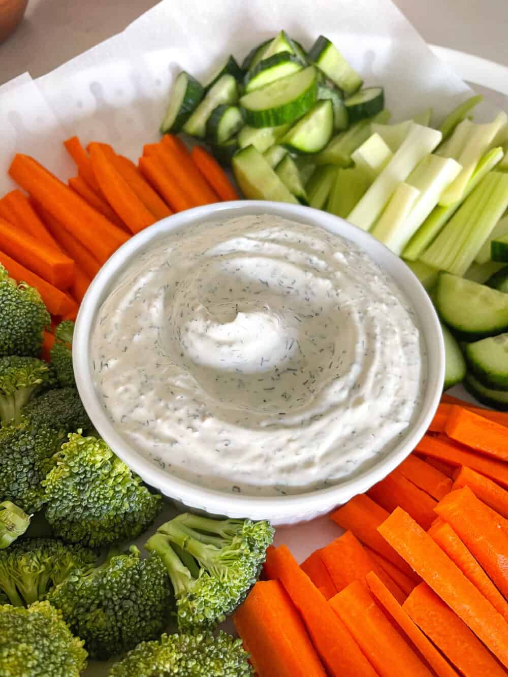 veggie dip in bowl with vegetables to dip