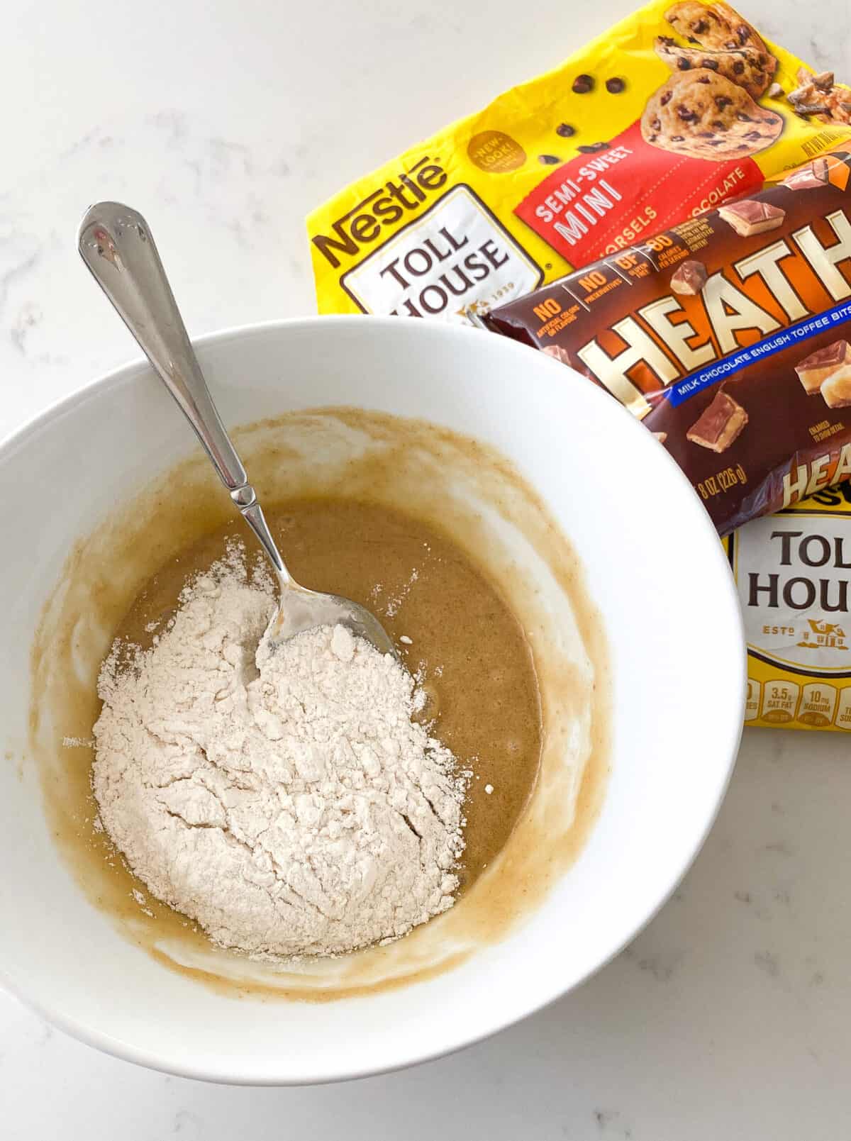giant chocolate chip cookie ingredients in bowl