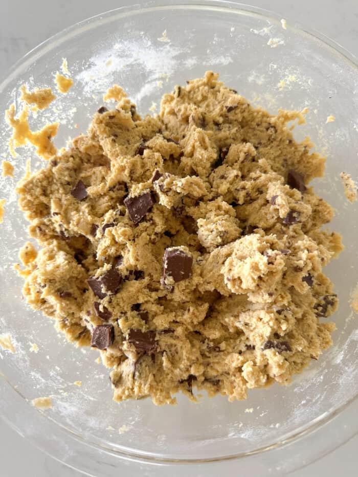 chewy chocolate chip cookie dough in mixing bowl