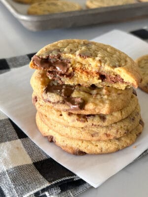 chewy chocolate chip cookies stacked and cut in half
