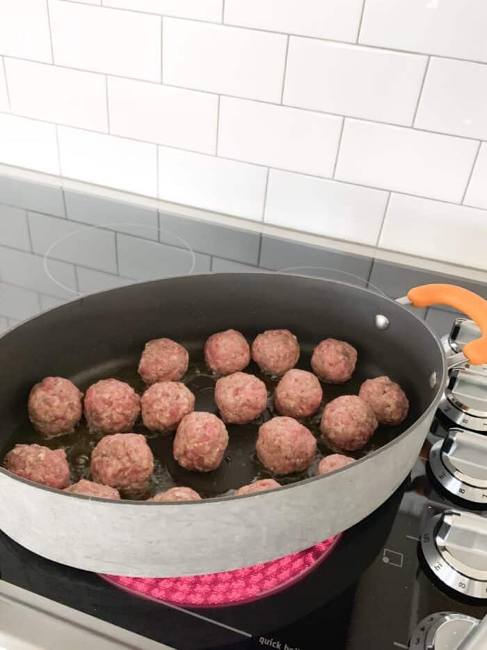 meatballs added to hot pan