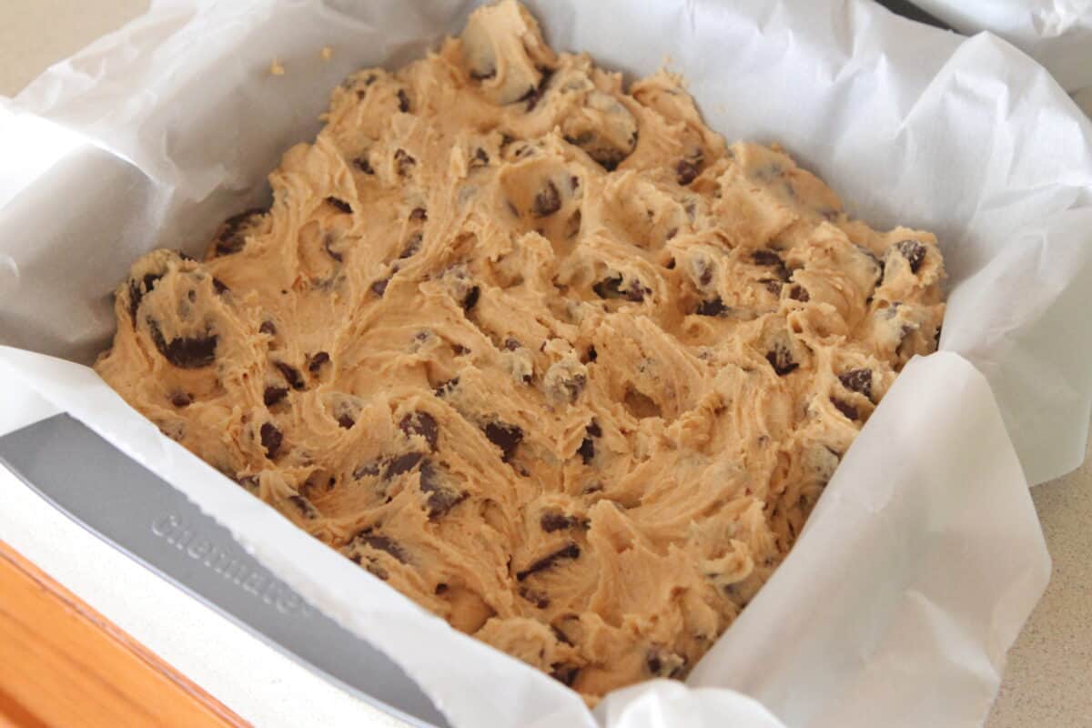 chocolate chip cookie bar dough in pan