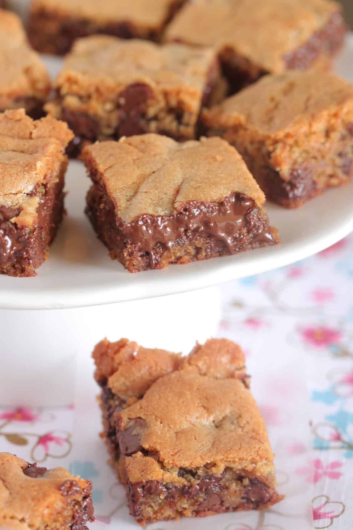 chocolate chip cookie bars on cake stand