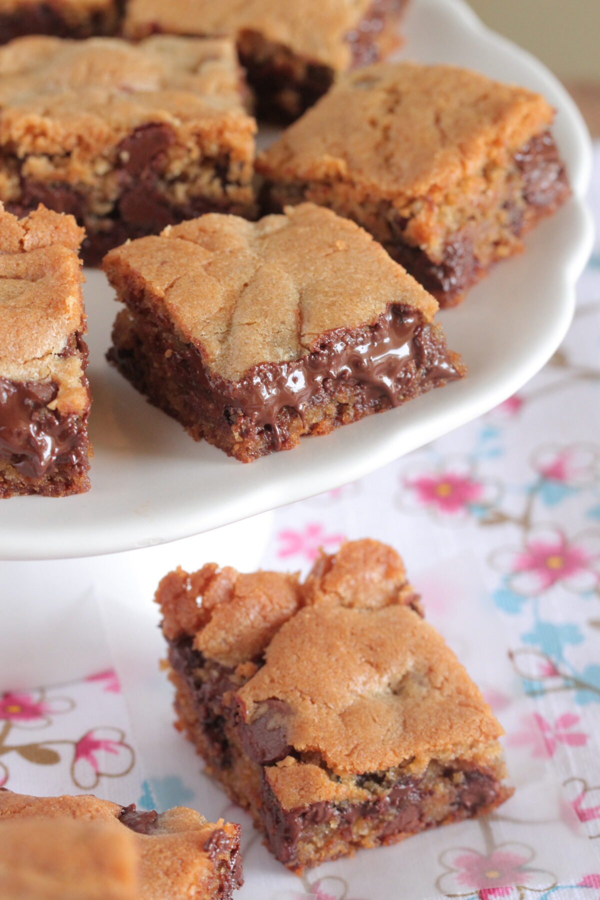 chocolate chip cookie bars on cake stand