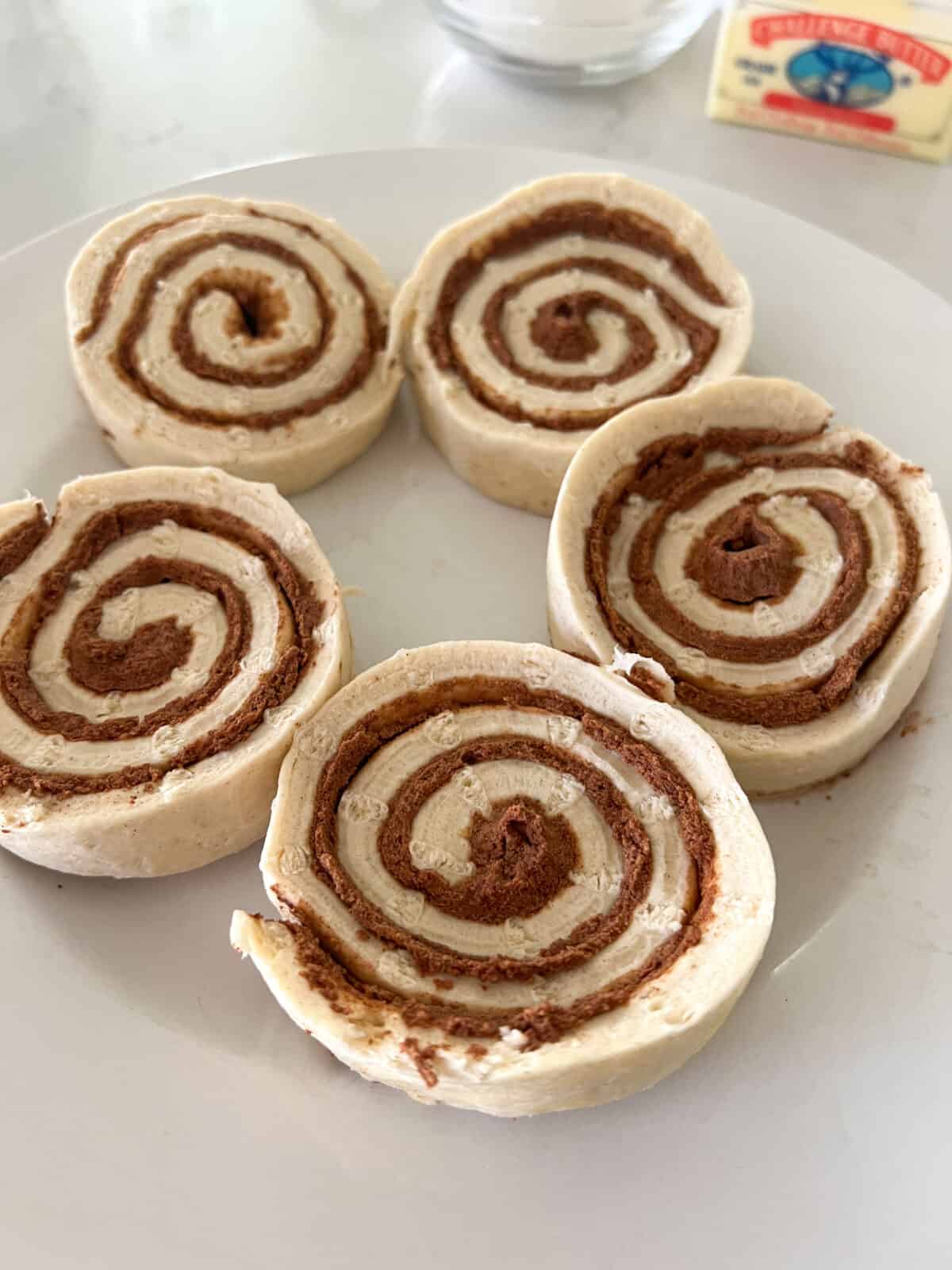 refrigerated cinnamon roll dough on plate