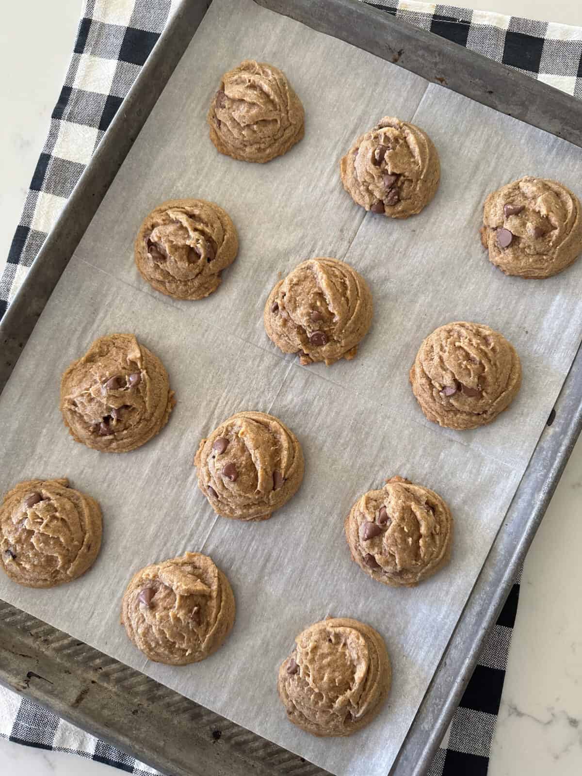 pumpkin spice cookies on baking sheet