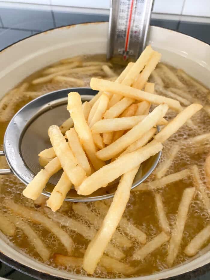 french fries coming out of oil