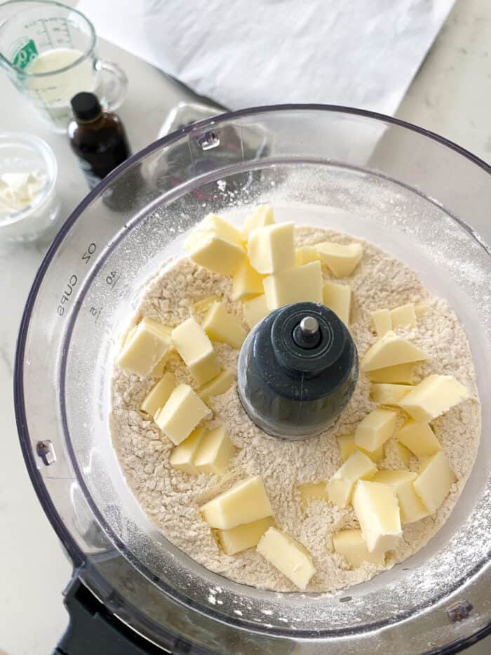 cubed butter added to food processor