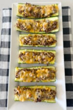 baked beef taco zucchini boats on serving plate
