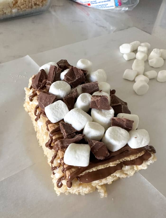 chocolate and marshmallows added to top of rice krispie treats