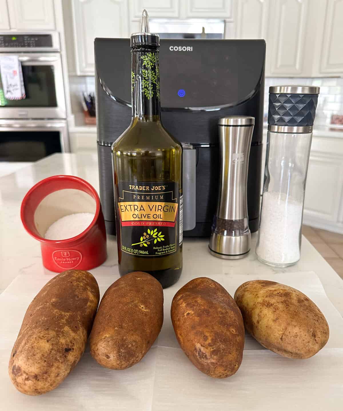 ingredients for air fryer baked potatoes on counter
