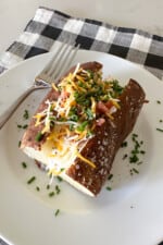 loaded baked potato on serving plate