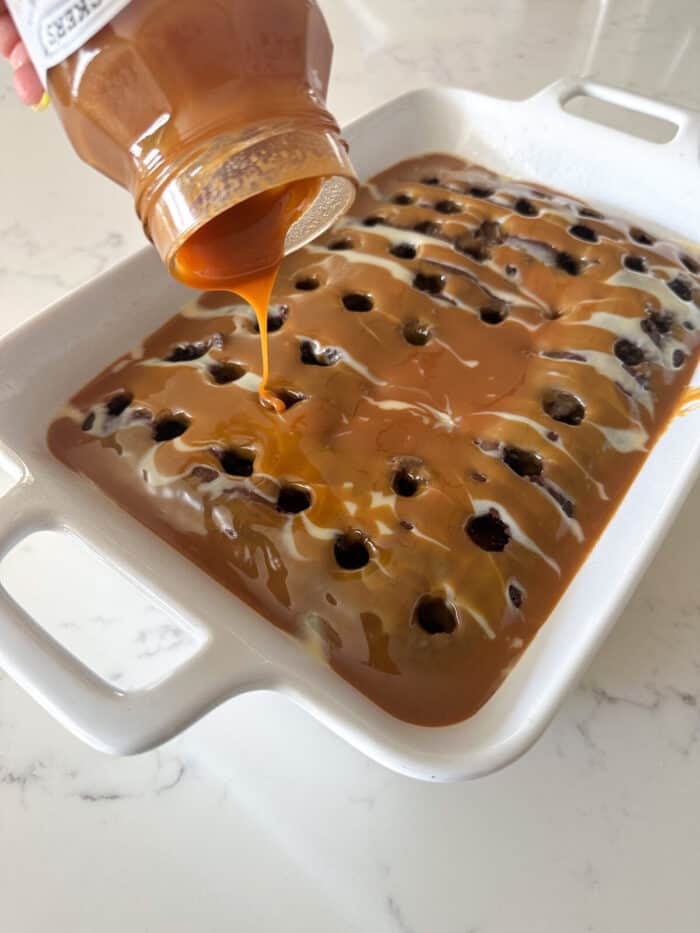 pouring caramel layer over better than sex cake