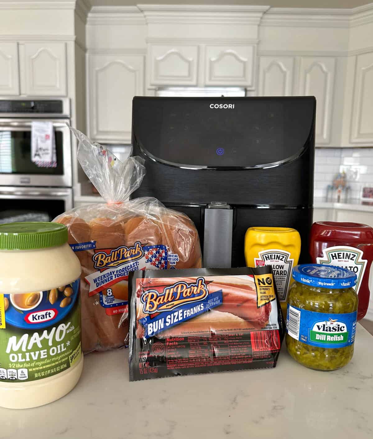 air fryer hot dog ingredients on counter top.