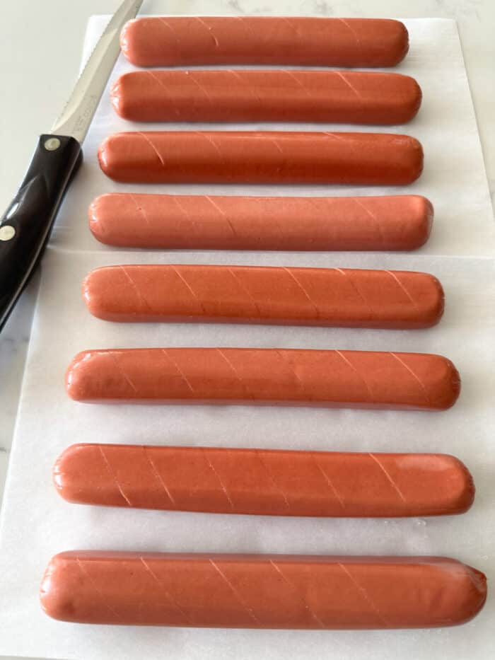 hot dogs with slits ready to cook