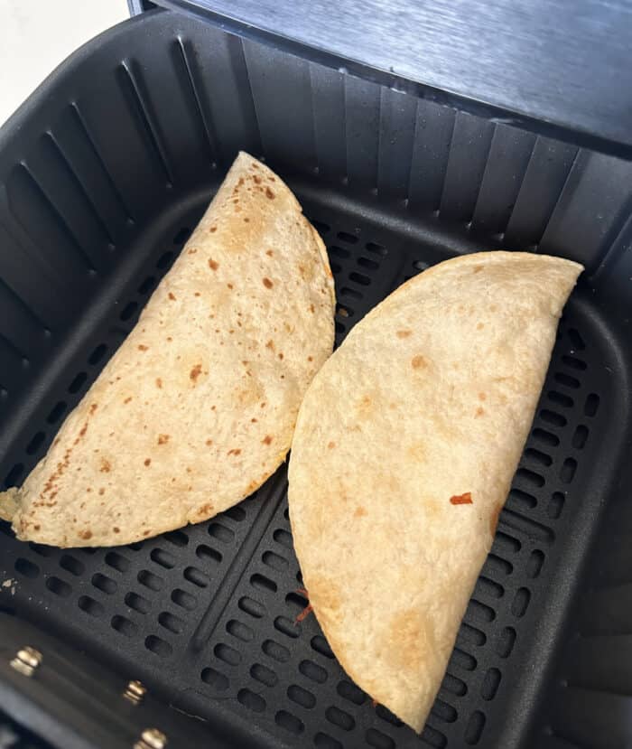 cooked quesadilla in air fryer basket