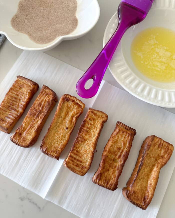 french toast sticks on parchment paper