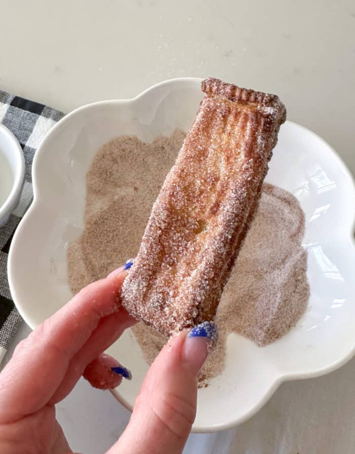 french toast sticks dipped in cinnamon sugar