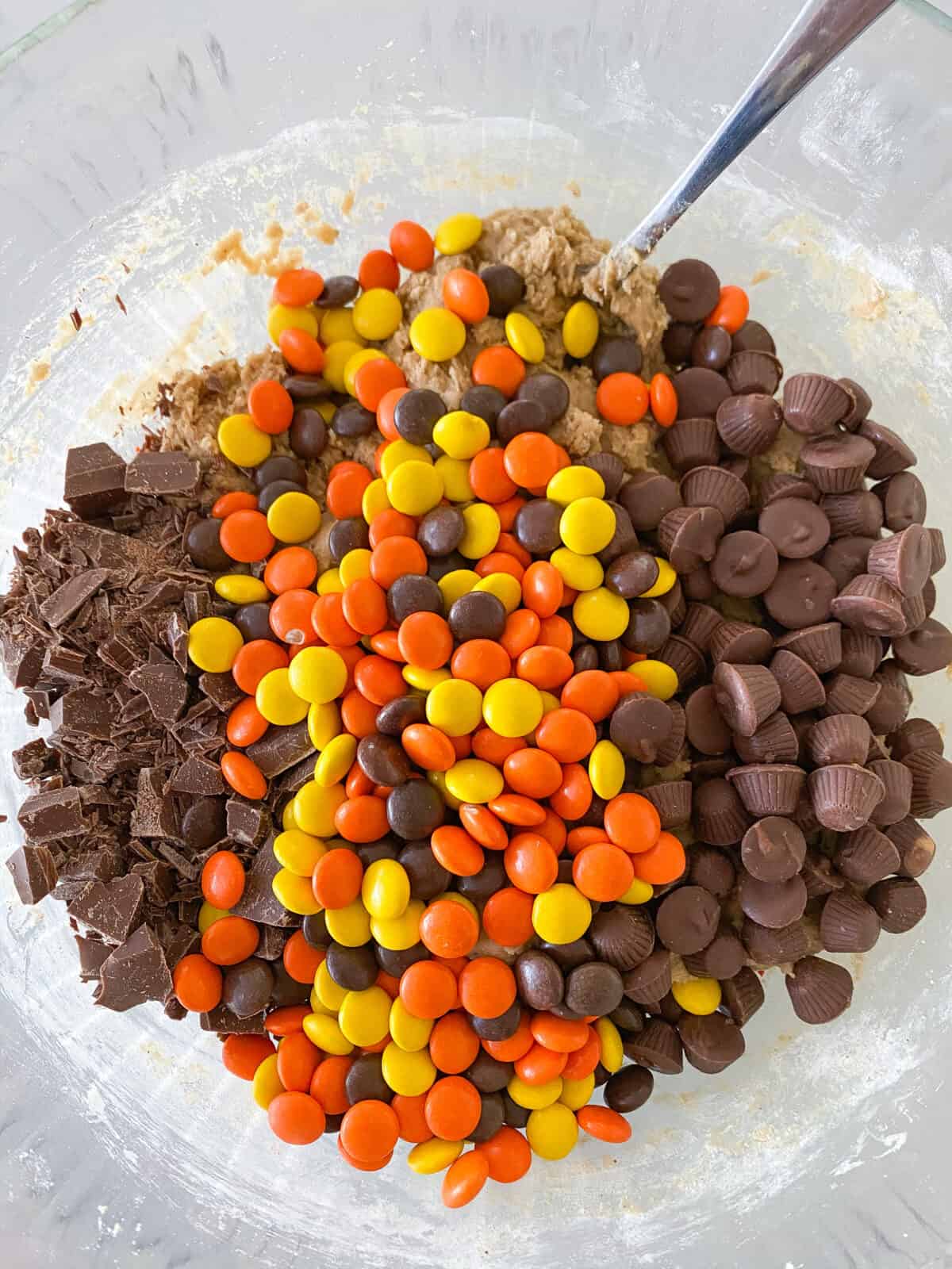 candy and chocolate added to monster cookie dough
