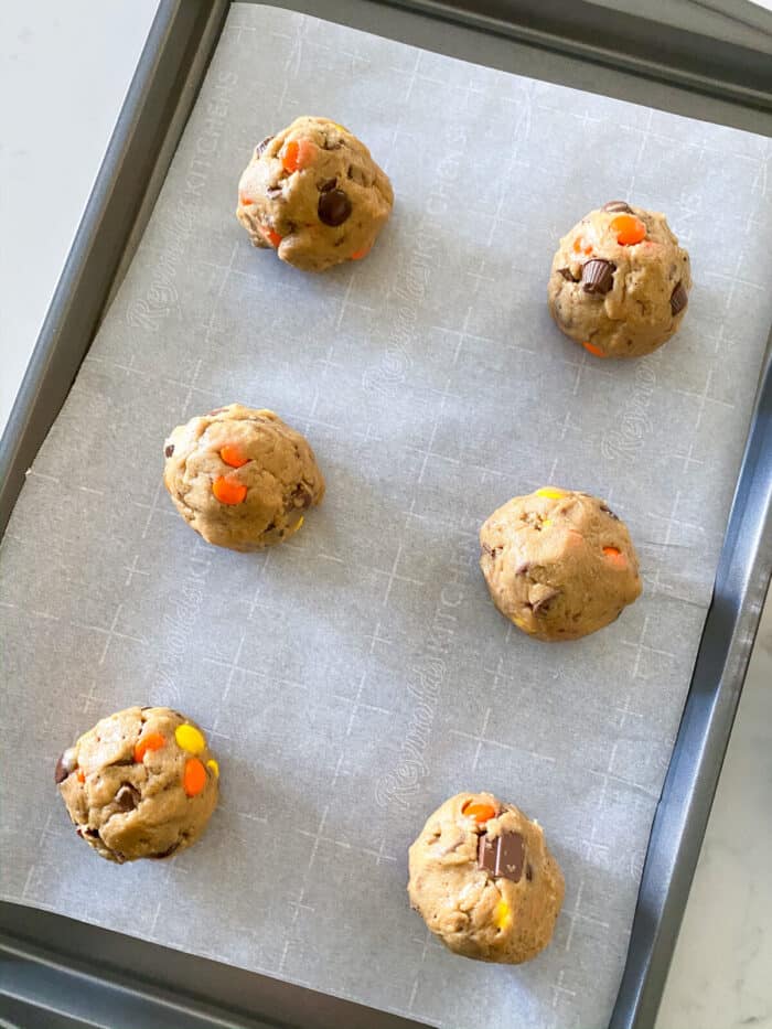 monster cookie dough on baking sheet