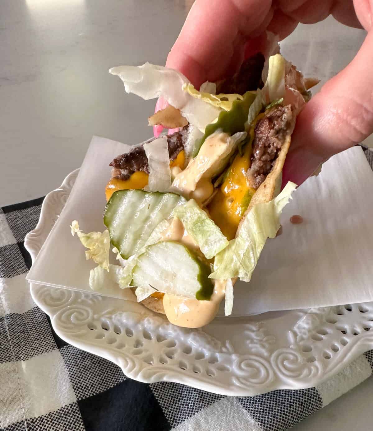 smashburger taco in hand