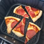pizza inside air fryer basket