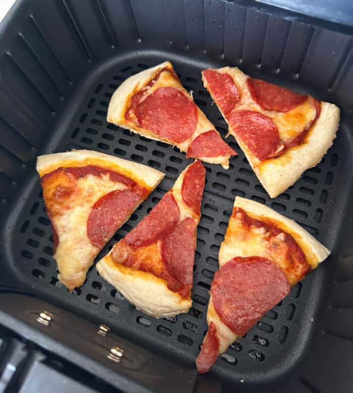 pizza inside air fryer basket