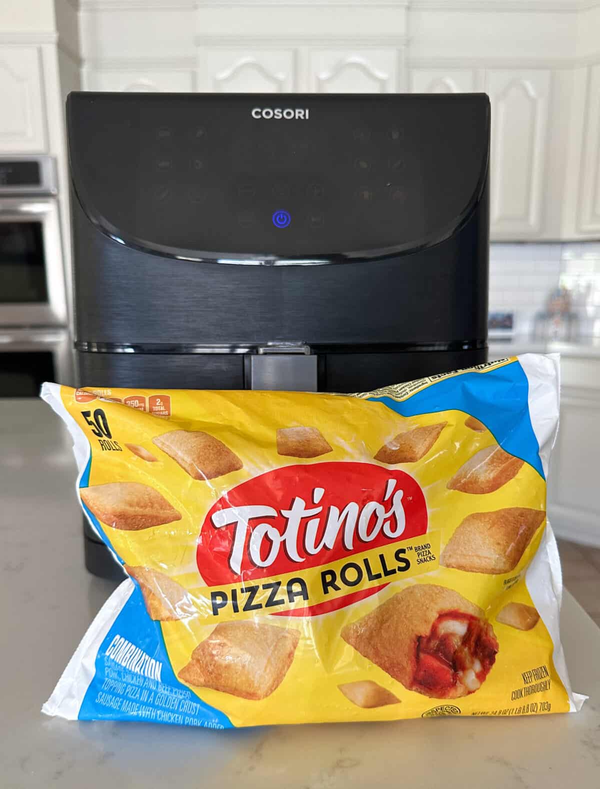 bag of pizza rolls and air fryer on counter