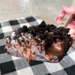 air fryer brownies on spatula showing gooey center