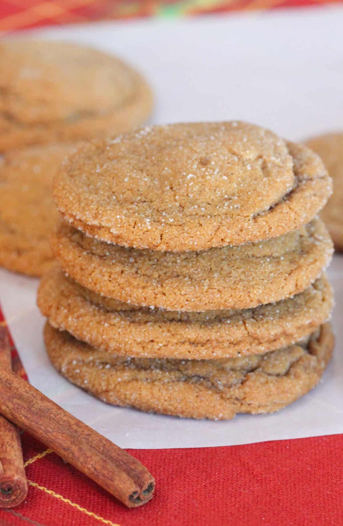 gingersnap cookies stacked on a serving napkin