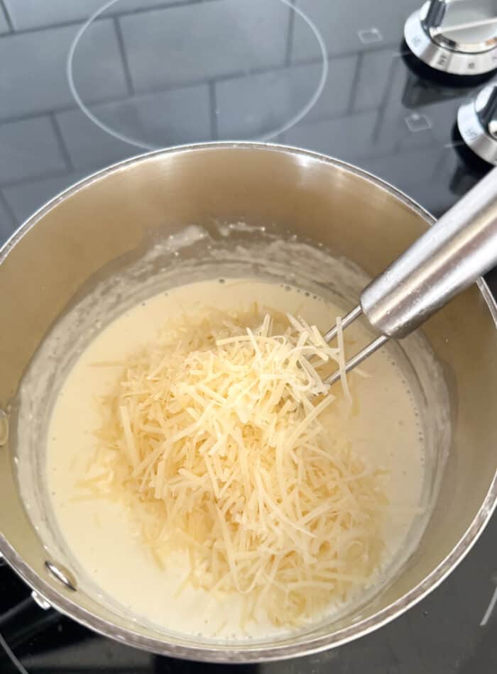 parmesan added to saucepan