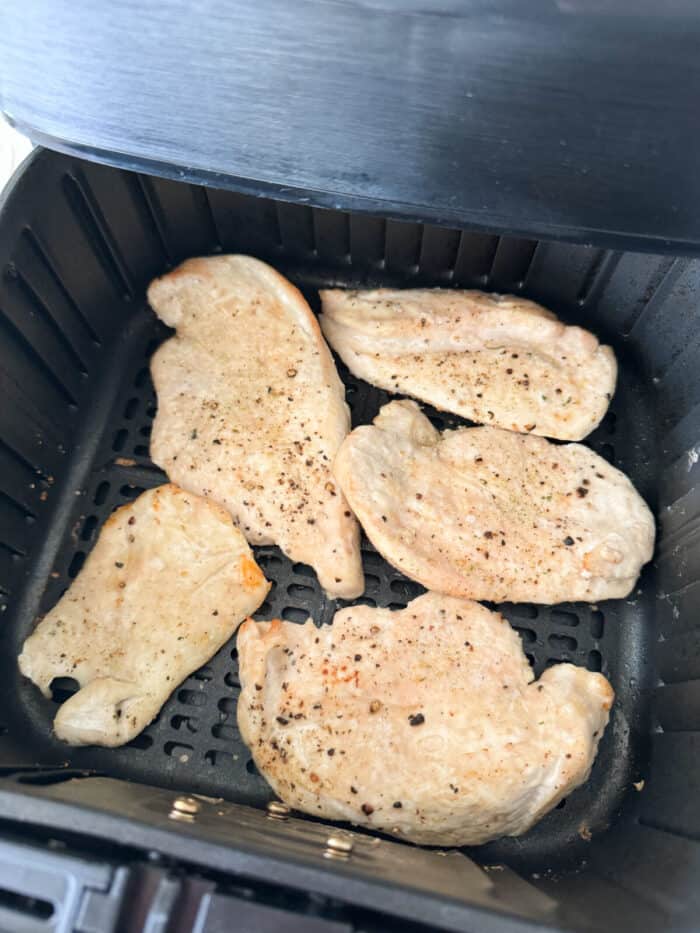 cooked chicken in air fryer basket