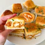 holding buffalo chicken slider to show inside