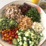 ingredients for mediterranean salad in large salad bowl