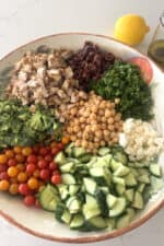ingredients for mediterranean salad in large salad bowl